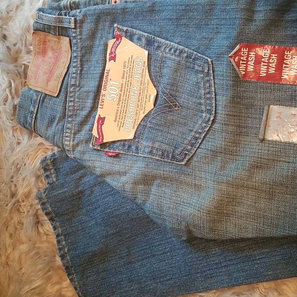 Vintage 501 Levis, button fly, Preshrunk, 100% cotton jeans.